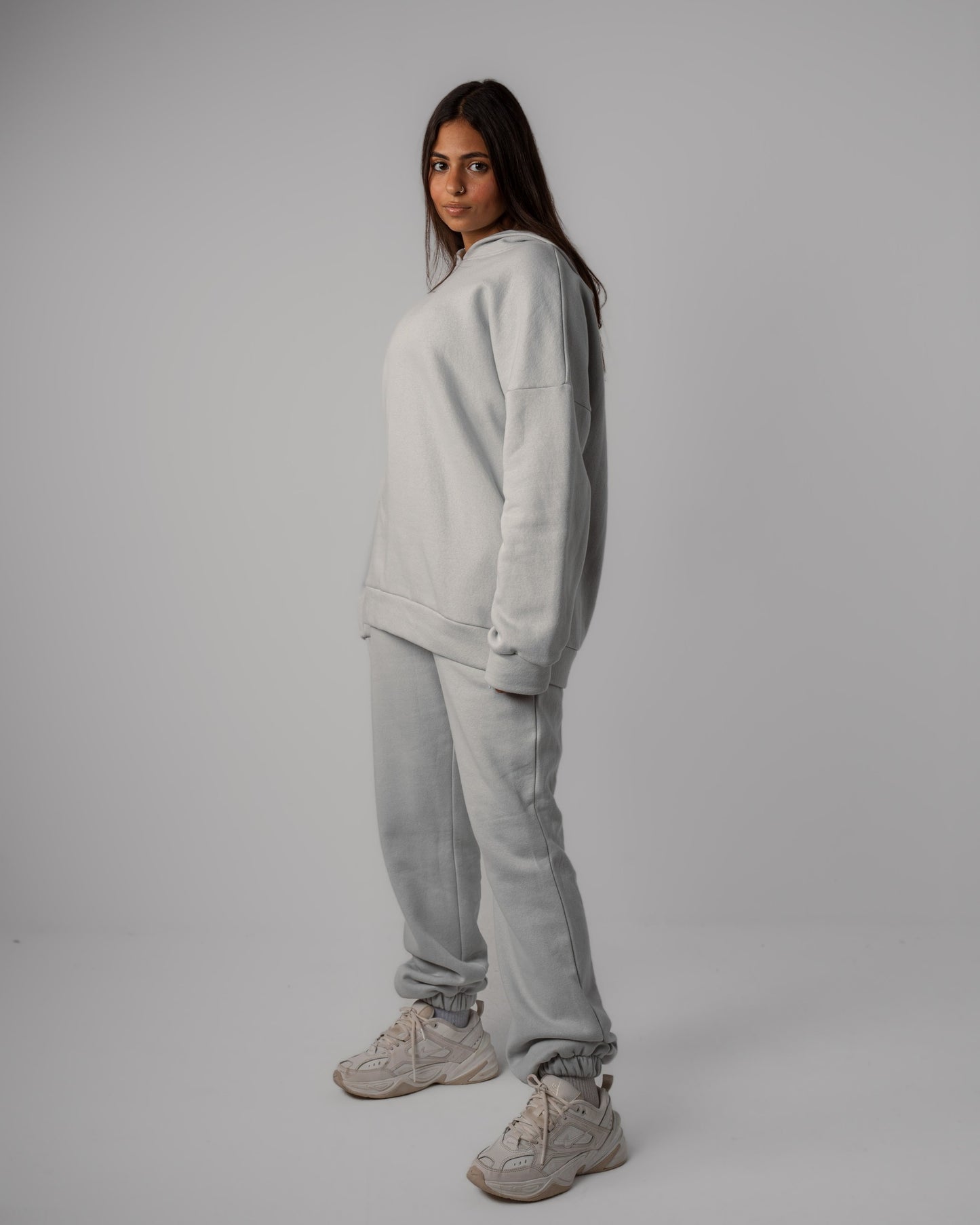 Matching set of gray Hoodie and Cuffed Jogger sideview