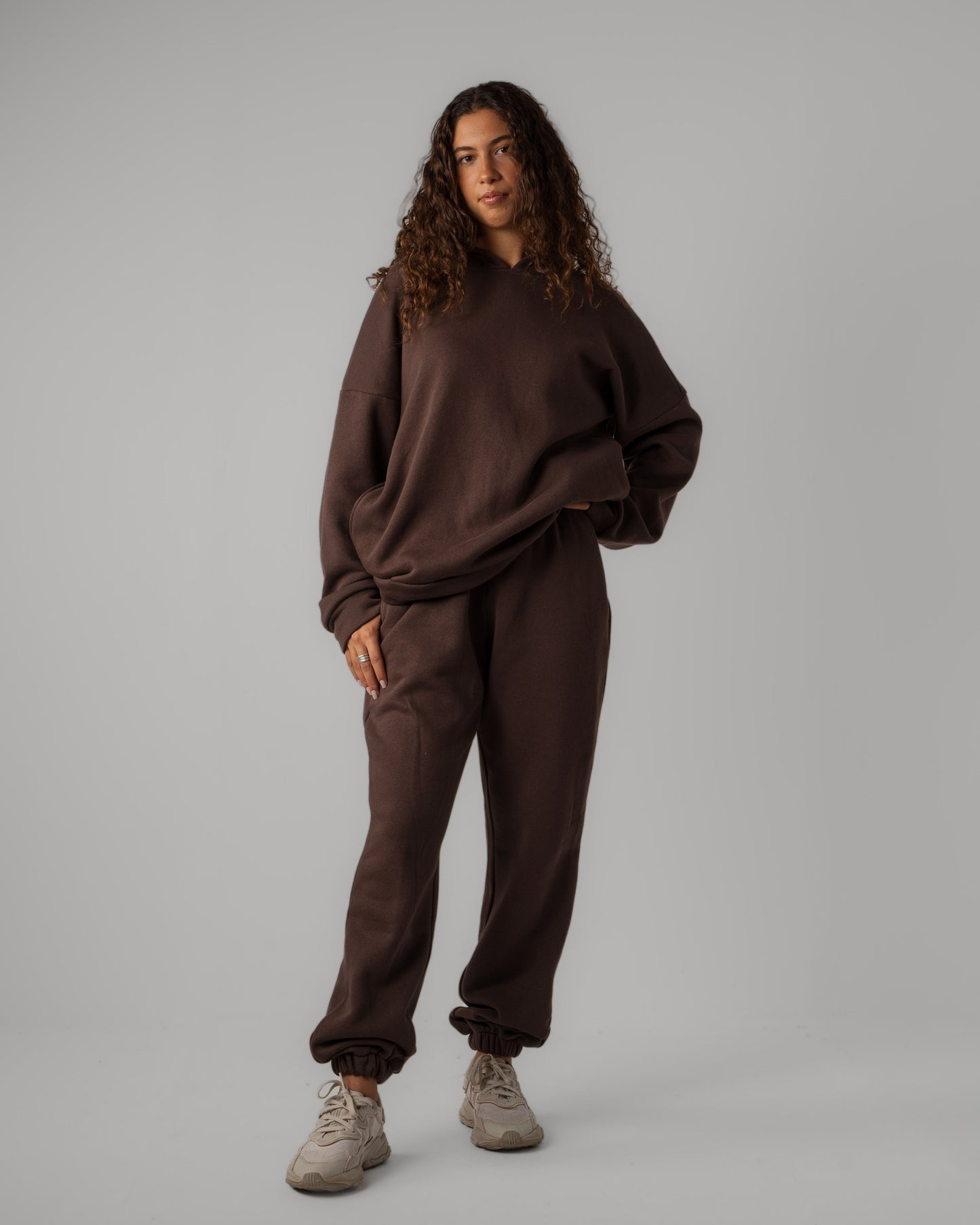 Matching brown set of Oversized Hoodie and Cuffed Jogger frontview